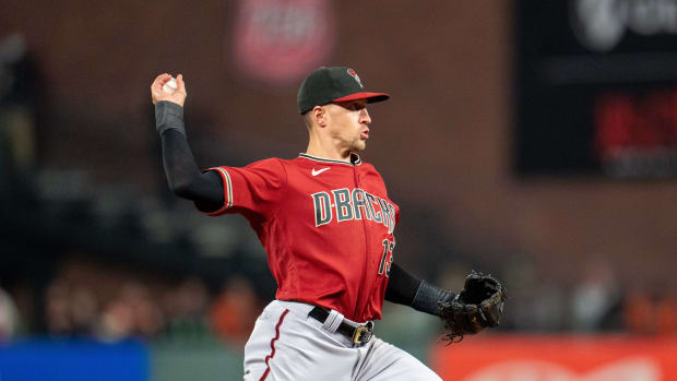 Arizona Diamondbacks shortstop Nick Ahmed throws out SF Giants second baseman Wilmer Flores (not pictured). (2021)